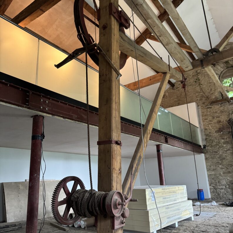 image0 21.5mm toughened laminated glass balustrade installation at Grade II listed Summerseat Railway Goods Shed by NW Fabrications