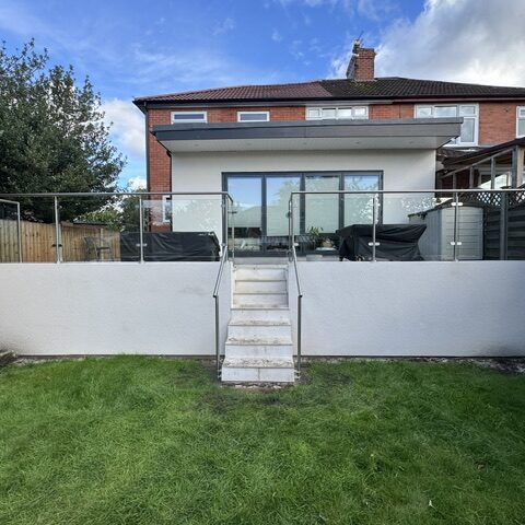 chadderton_front 316-grade stainless steel framed balustrade with self-closing glass gate installation in Chadderton by NW Fabrications ``` **Option 2 (118 characters - more descriptive):** ``` Stainless steel framed glass balustrade with magnetic self-closing gate and handrail installed in Chadderton garden ``` **Option 3 (107 characters - location focused):** ``` Modern stainless steel and glass balustrade system with self-closing gate installed in Chadderton, Oldham